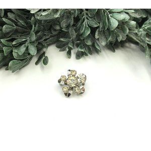 Vintage brooch silver tone flower shape with clear rhinestones